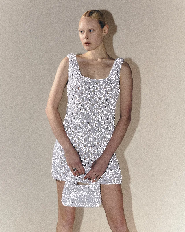 Transitional dresses for in-between seasonsReflective couture mini dress