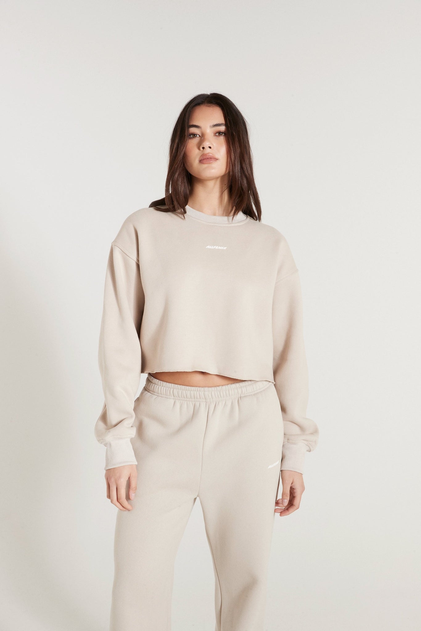 women's hooded sweatshirts with a high-low sleeve designAll Fenix Crew Crop Sweater