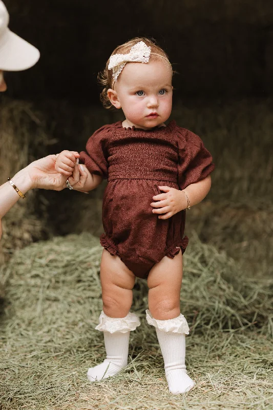 Custom-made dresses for personalized fitsBaby Lani Romper in Brown